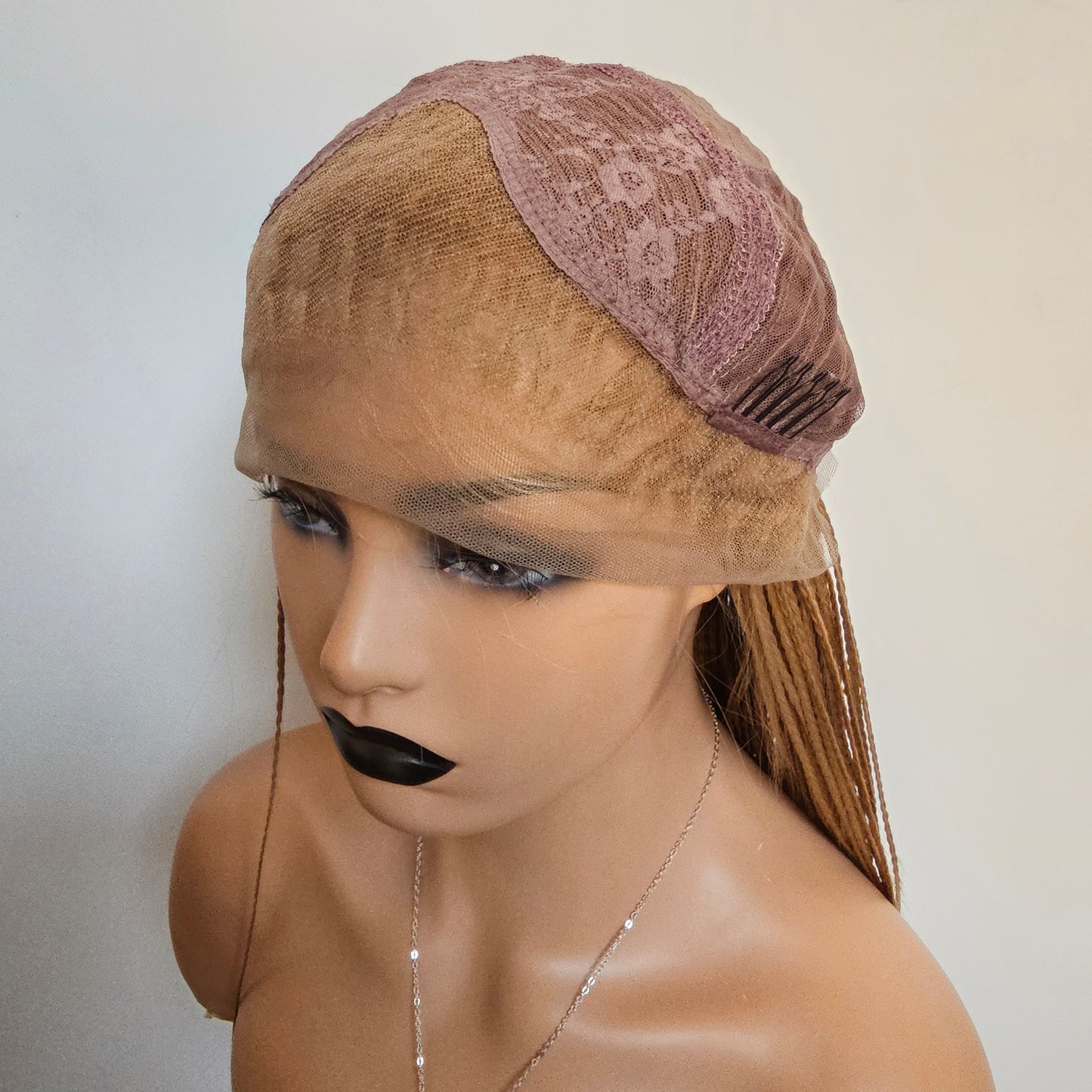 Sandy blonde braided lace front wig