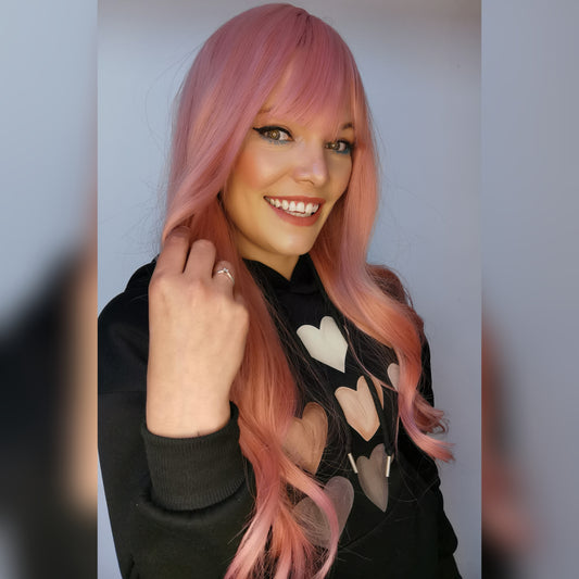 Flossy pink synthetic wig